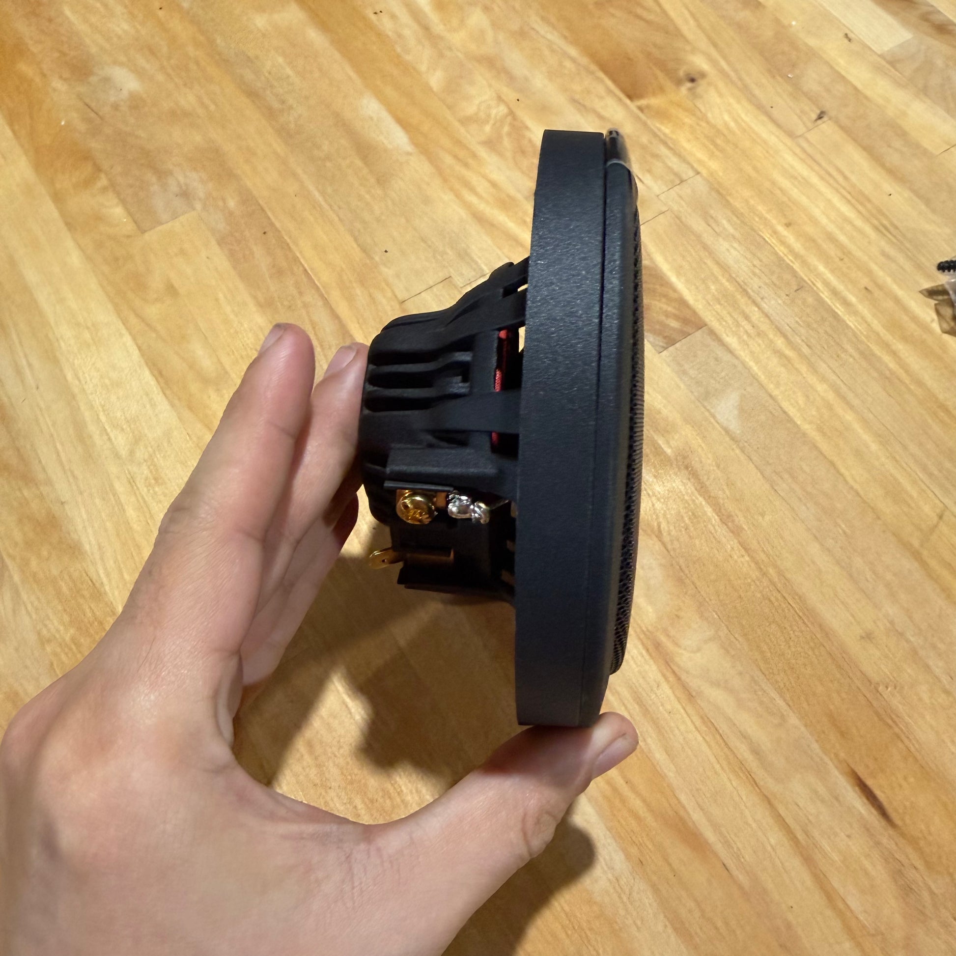 Image showing the flush grille in standard mounting mode utilizing the included spacer from the side.